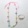 Multi flower pearl necklace set with ribbon